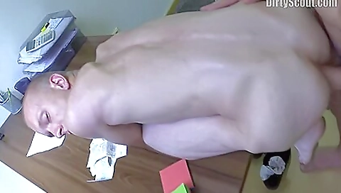 Bareback sex scene with a brunette girl in an office