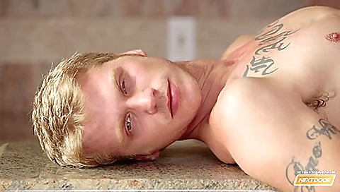 Hot amateur blonde with a beautiful tattoo is cumshot on the beach