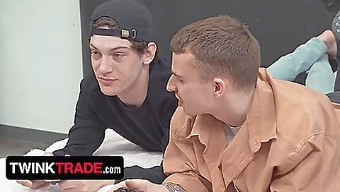 Two stepsons swapping their dicks on camera in a threesome