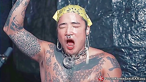 Asian guy enjoys a large cock and piercings his ass