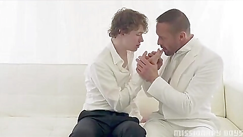 A hot brunette missionary boy is giving a blowjob to a sexy milf