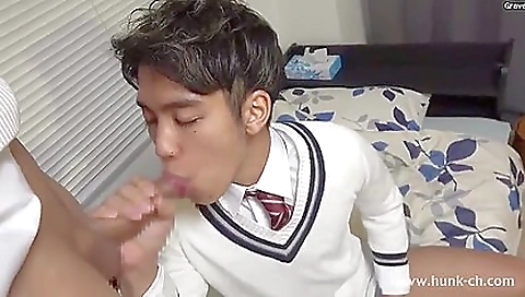Japanese teen with a shaved pussy watching a gay scene