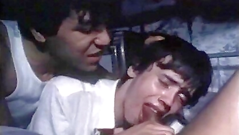 A old man with a deepthroat is giving an oral sex to his prisoners