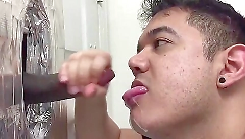 Brunette gives a handjob to the black cock in her hole