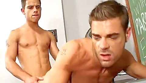 Sexy teacher with big tits and a muscular body is having fun