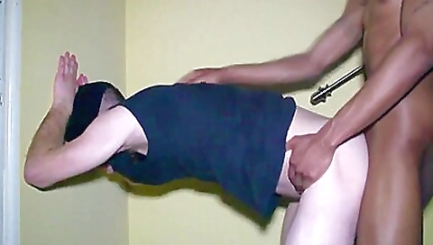 Black guy in stockings and underwear gets fucked on a black sofa
