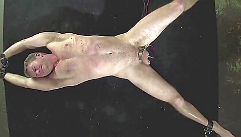 Police slut is tied up with a mask in bondage video